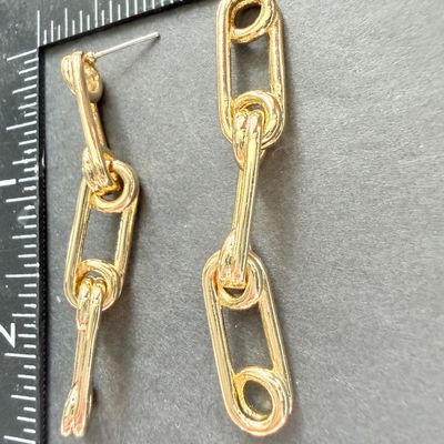 Gold tone dangle earrings