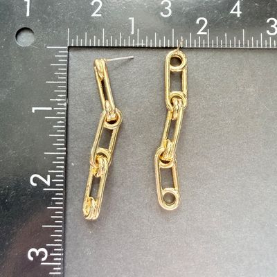 Gold tone dangle earrings