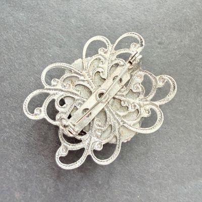 Vintage silver tone brooch