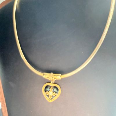 Vintage priemer design marked gold tone necklace