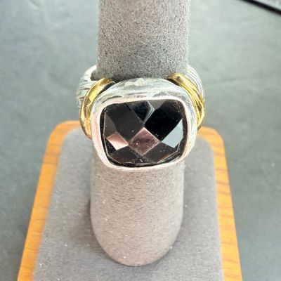Black stone center type silver tone ring