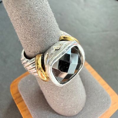 Black stone center type silver tone ring