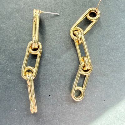 Gold tone dangle earrings