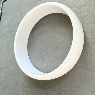White lucite type bangle bracelet