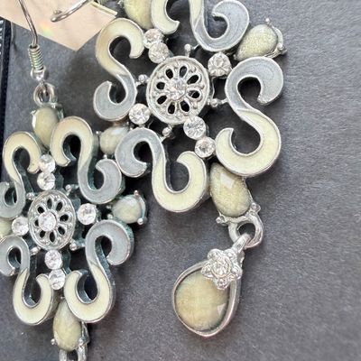 Beautiful silver tone dangle statement earrings