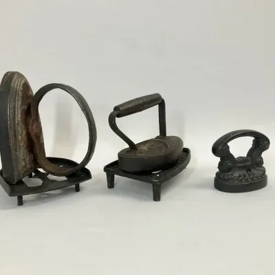 Vintage Cast Sad Irons And Iron Trivets