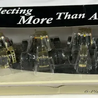 1/64 scale ERTL John Deere gold-plated or gold-chrome commemorative tractor set