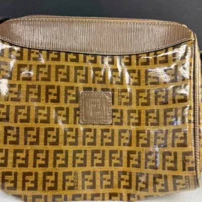Vintage Fendi FF Monogram PVC/Coated Canvas Crossbody Bag featuring the iconic brown Zucca logo patt