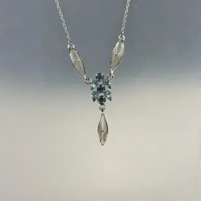 Vintage Van Dell Sterling Silver Crystal Blue Rhinestone Necklace and Earrings Set features a delica