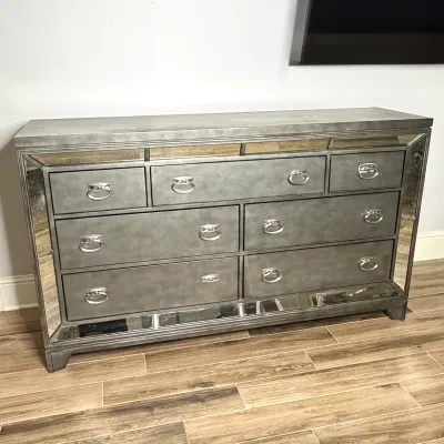 Platinum Finish 7 Drawer Dresser w Mirrored Side Panels and Ring Pull Hardware 