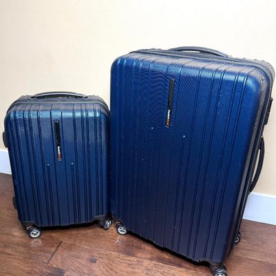 Set of 2 Traveler’s Choice Spinner Suitcases 