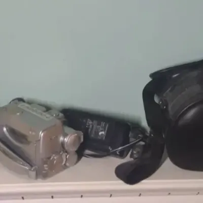 Two Camcorders And A Fuji Camera 