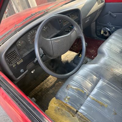 Sale Photo Thumbnail #31: 1991 Toyota pick up, we have four different sets of Toyota keys. None of them are Turning in the ignition. The neighbor stated that the vehicle was his daily runner, but we are unable to start it. Clean title, VIN number
 JT4RN8187M5108476.