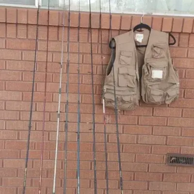 Fishing Poles And Vest