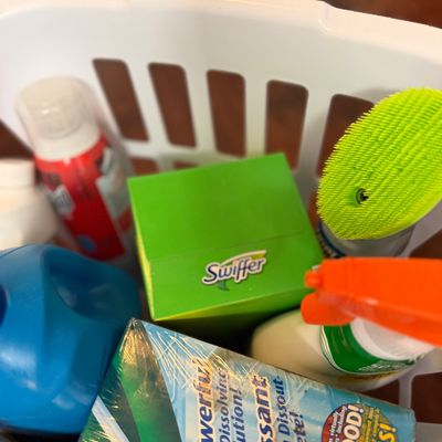 2 Laundry Baskets Full of Cleaning Supplies