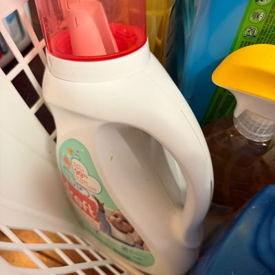 2 Laundry Baskets Full of Cleaning Supplies