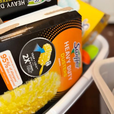 2 Laundry Baskets Full of Cleaning Supplies