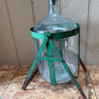 Glass Demijohn in Green Metal Stand