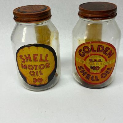 Pair Shell & Golden Shell Oil Jars