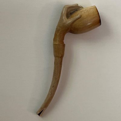 Sale Photo Thumbnail #694: Carved Meerschaum Pipe w/ Hand & Egg