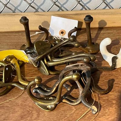 Sale Photo Thumbnail #339: 12 Architectural Brass & Ceramic Hooks