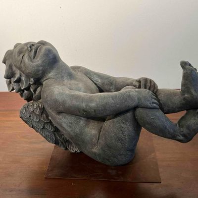 Sale Photo Thumbnail #238: Cast Stone Reclining Cherub Sculpture