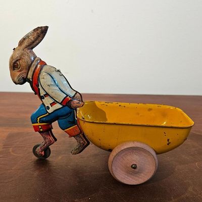 Sale Photo Thumbnail #299: Marx Tin Wind-Up Rabbit Wheelbarrow Toy