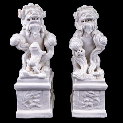 Chinese Blanc de Chine Porcelain Foo Dogs Pair
