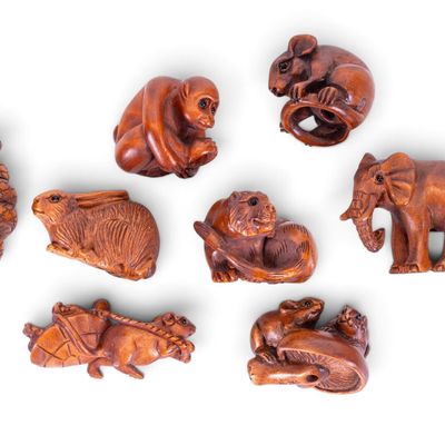 Eight Carved Wooden Netsuke