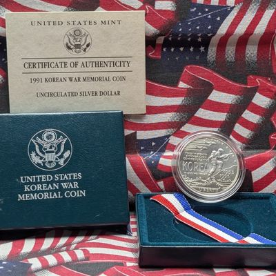Sale Photo Thumbnail #408: 1991-D US Korean War Memorial Unc. 90% Silver Dollar with OGB and COA