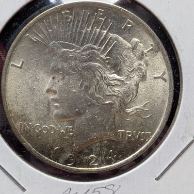 Sale Photo Thumbnail #410: 1924 US Peace Silver Dollar, 90% Silver 26.73g