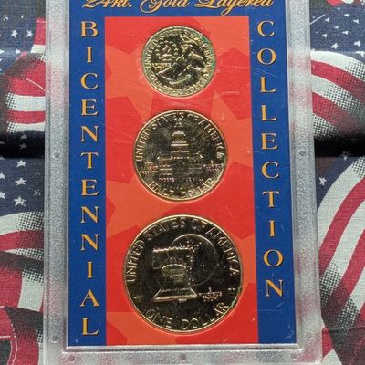 Sale Photo Thumbnail #99: (3) 24 kt. Gold Plated Bicentennial Coins In Case - 1976-D Eisenhower One Dollar, 1976-D Kennedy Half Dollar, & 1976-P Washington Quarter