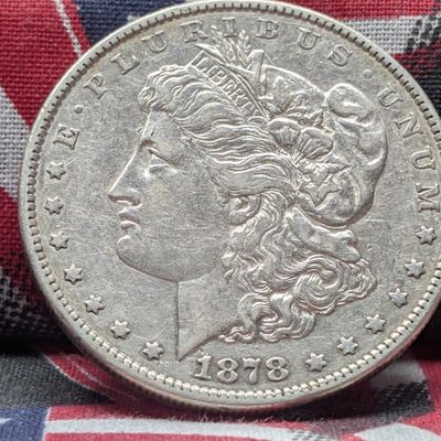 Sale Photo Thumbnail #62: 1878 7TF rev 79 Morgan Silver Dollar, 90% Silver