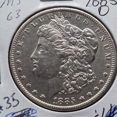 Sale Photo Thumbnail #180: 1885-O Morgan 90% Silver Dollar