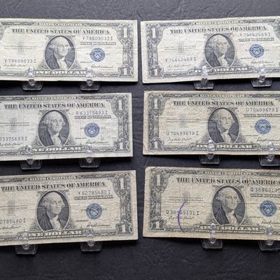 Sale Photo Thumbnail #75: (6) 1935-F US $1 Silver Certificates - Blue Seals, One is a Major Off Centered Note