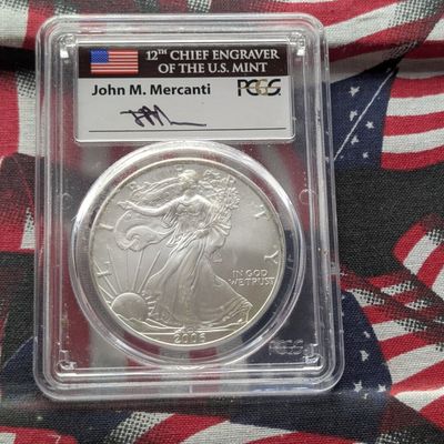 Sale Photo Thumbnail #349: 2006 American Silver Eagle, .999 Fine Silver 1 Troy Oz - PCGS Gem Uncirculated - John M. Mercanti Signature Label