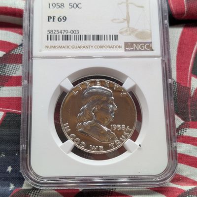 Sale Photo Thumbnail #302: 1958 Franklin 90% Silver Half Dollar NGC PF 69