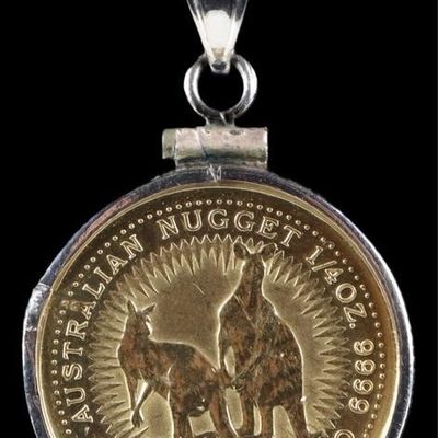 Sale Photo Thumbnail #101: 14K YELLOW GOLD NECKLACE W/ AUSTRALIAN $25 COIN