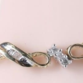 Sale Photo Thumbnail #401: SHINY 10K YELLOW GOLD LADIES BRACELET W/ DIAMONDS