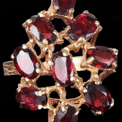 Sale Photo Thumbnail #416: 14K YELLOW GOLD LADIES RING W/ 9 GARNET GEMSTONES