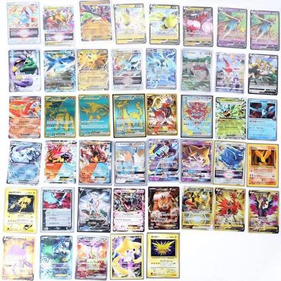 Sale Photo Thumbnail #415: LEGENDARY HOLO POKEMON CARDS JIRACHI TORNADUS (55)