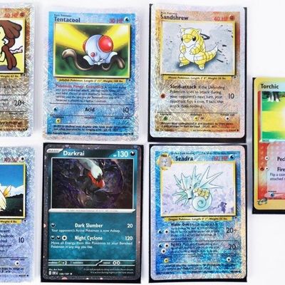 Sale Photo Thumbnail #291: ASSORTED 2002-2023 COLLECTIBLE POKEMON CARDS - (7)