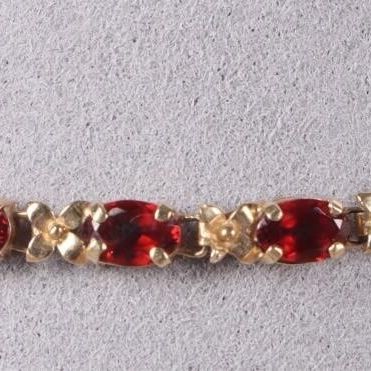 Sale Photo Thumbnail #417: 14K YELLOW GOLD LADIES BRACELET W/ GARNET STONES