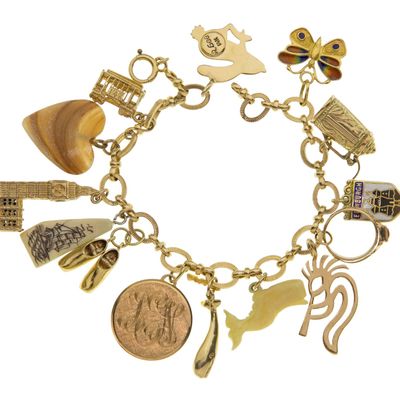 Sale Photo Thumbnail #334: 14k Yellow Gold Bracelet Having Mixed Gold Charms
