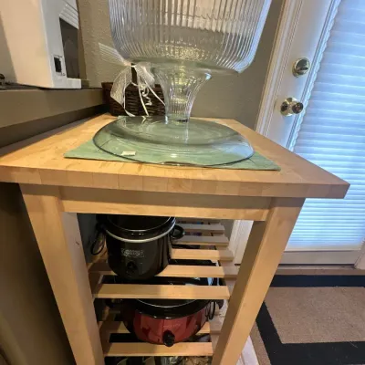 Butcher block with storage shelves
