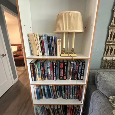 Bookshelf, books & table lamp