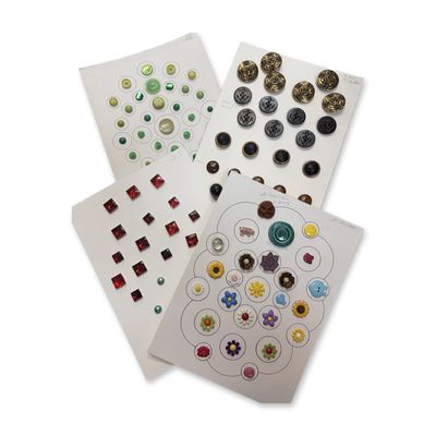 Sale Photo Thumbnail #166: A BOX LOT OF ASSORTED PLASTIC BUTTONS