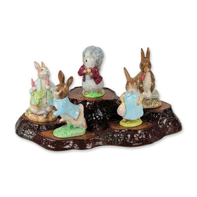Sale Photo Thumbnail #332: 5pc Beswick and Royal Doulton Beatrix Potter Figurines and Stand