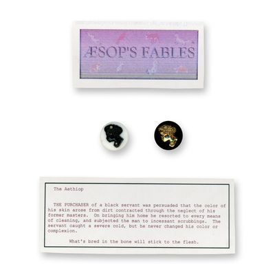 Sale Photo Thumbnail #378: A CARD OF DIVISION 1 WHITE GLASS & BLACK GLASS BUTTONS
