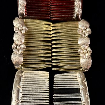 Sale Photo Thumbnail #131: A Collection of Sterling Silver Mounted Hair Side Combs